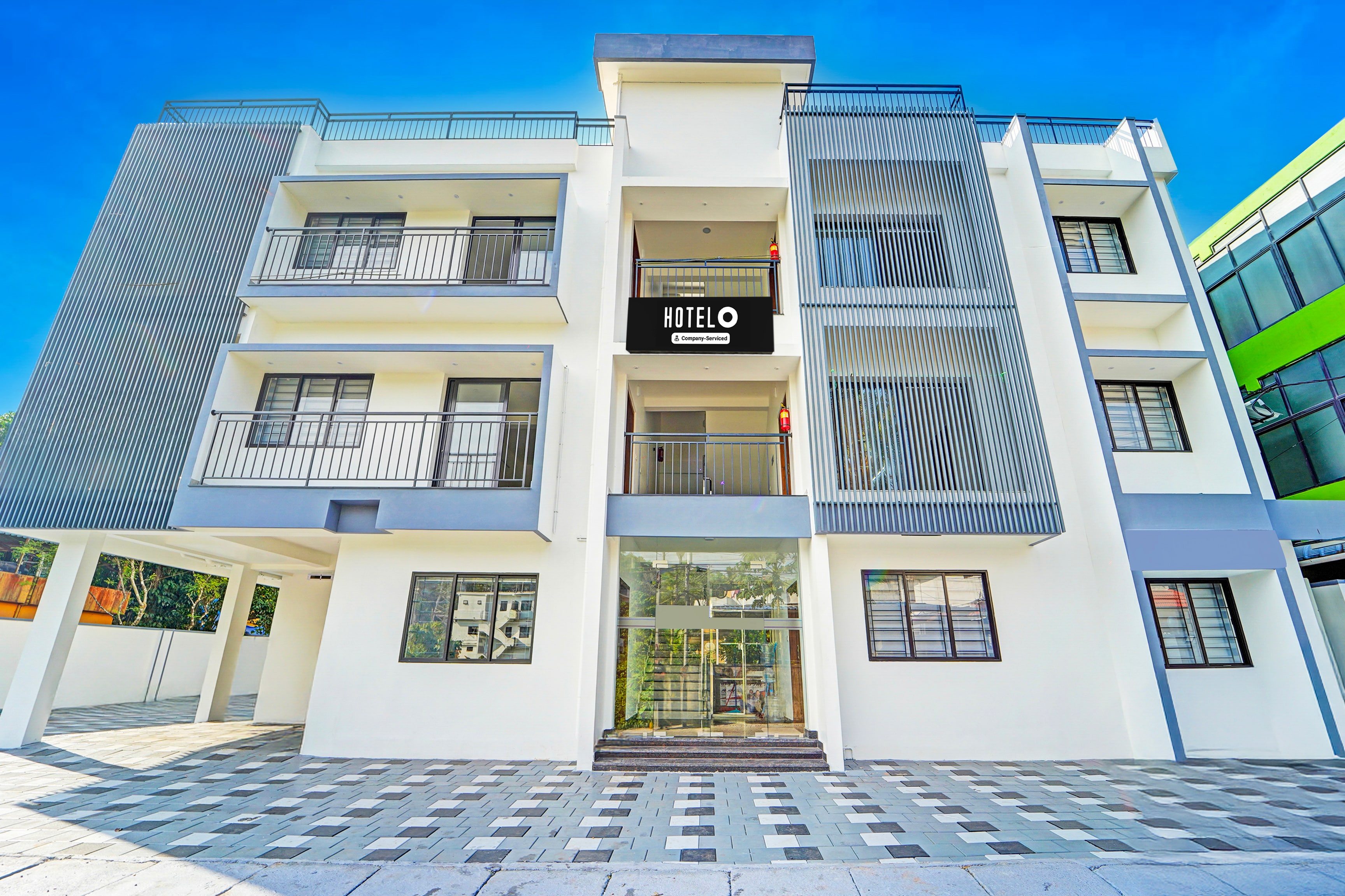 Super Hotel O Kalamassery Near Medical College - Tap to explore photos