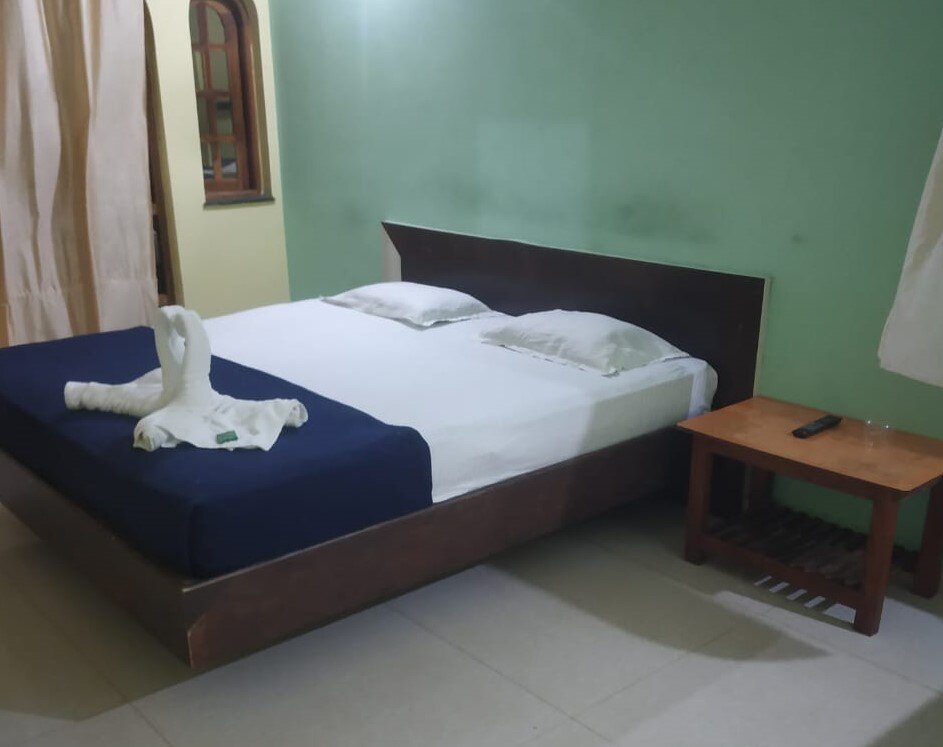 Sabina AC and Non-AC Rooms - Tap to explore photos