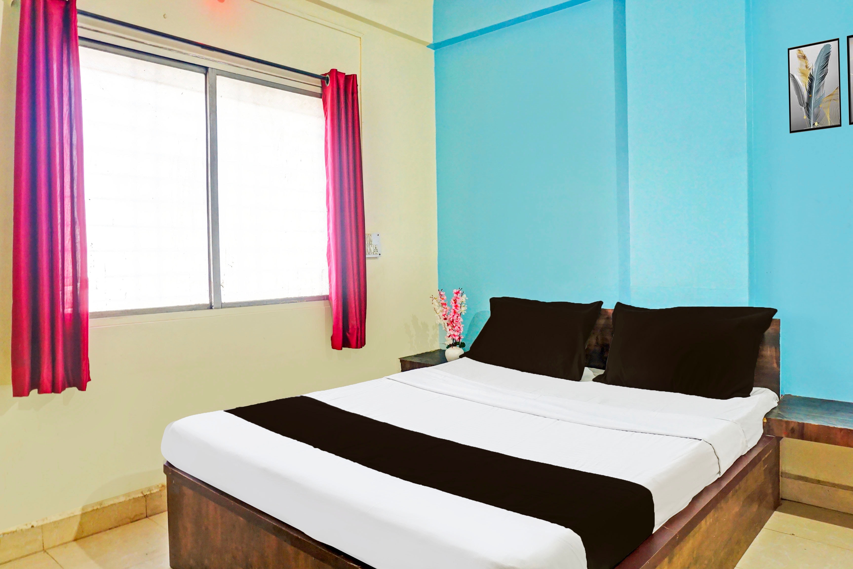 Hotel O Happy Lodging - Tap to explore photos