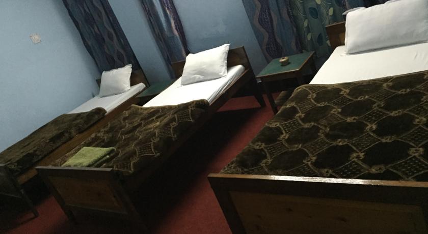 Himali Guest House - Tap to explore photos
