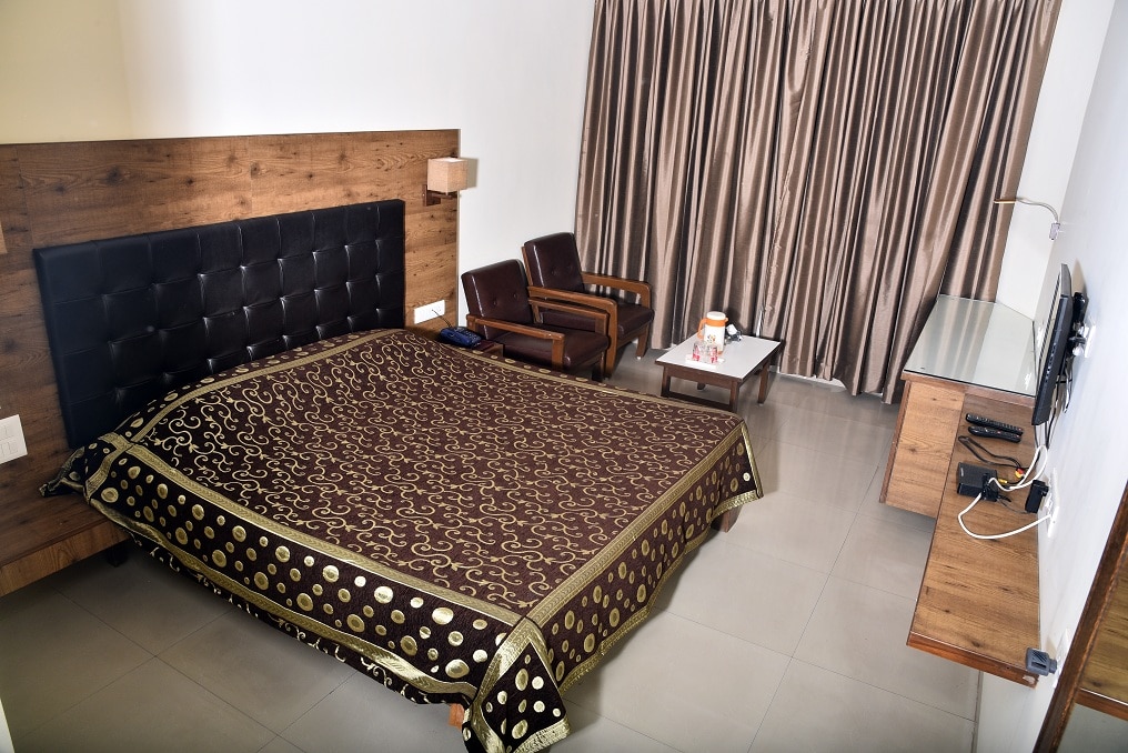 Hotel Adina Palace, Valsad - Tap to explore photos