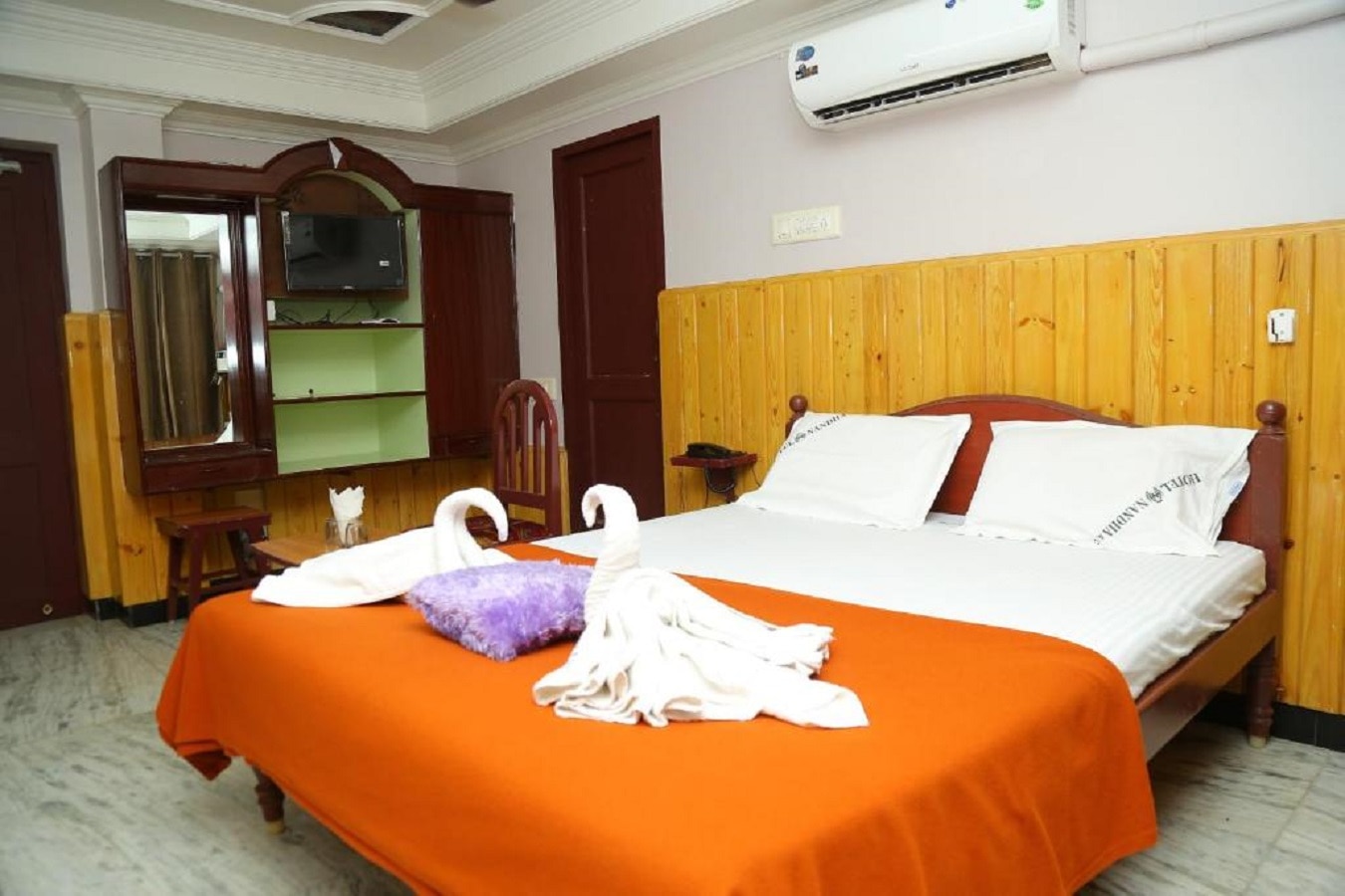 HOTEL NANDHA - Tap to explore photos