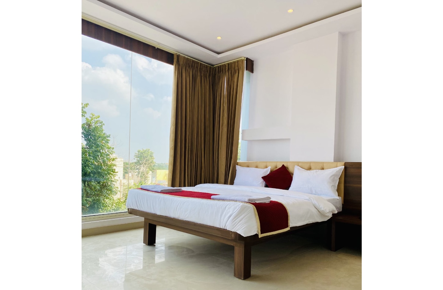 Tulips Inn Mysuru - Tap to explore photos