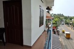 Vidhara Rooms | 5 min drive to KIMSHEALTH Hospital, Thiruvananthapuram