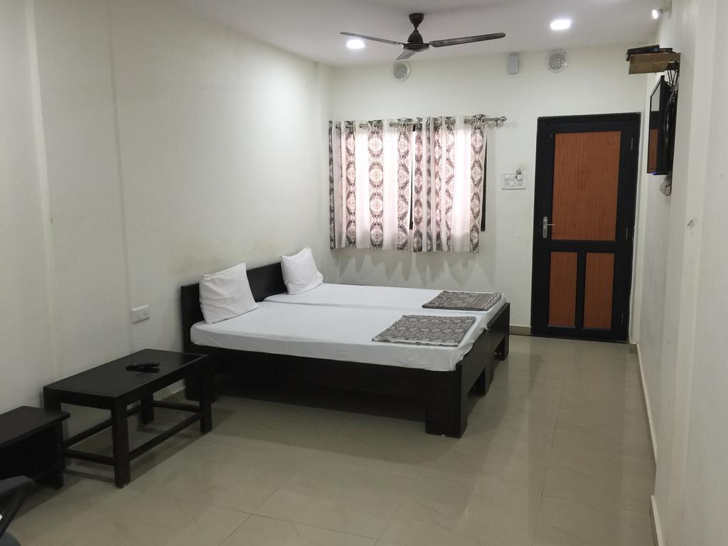 Sanjay Guest House - Tap to explore photos