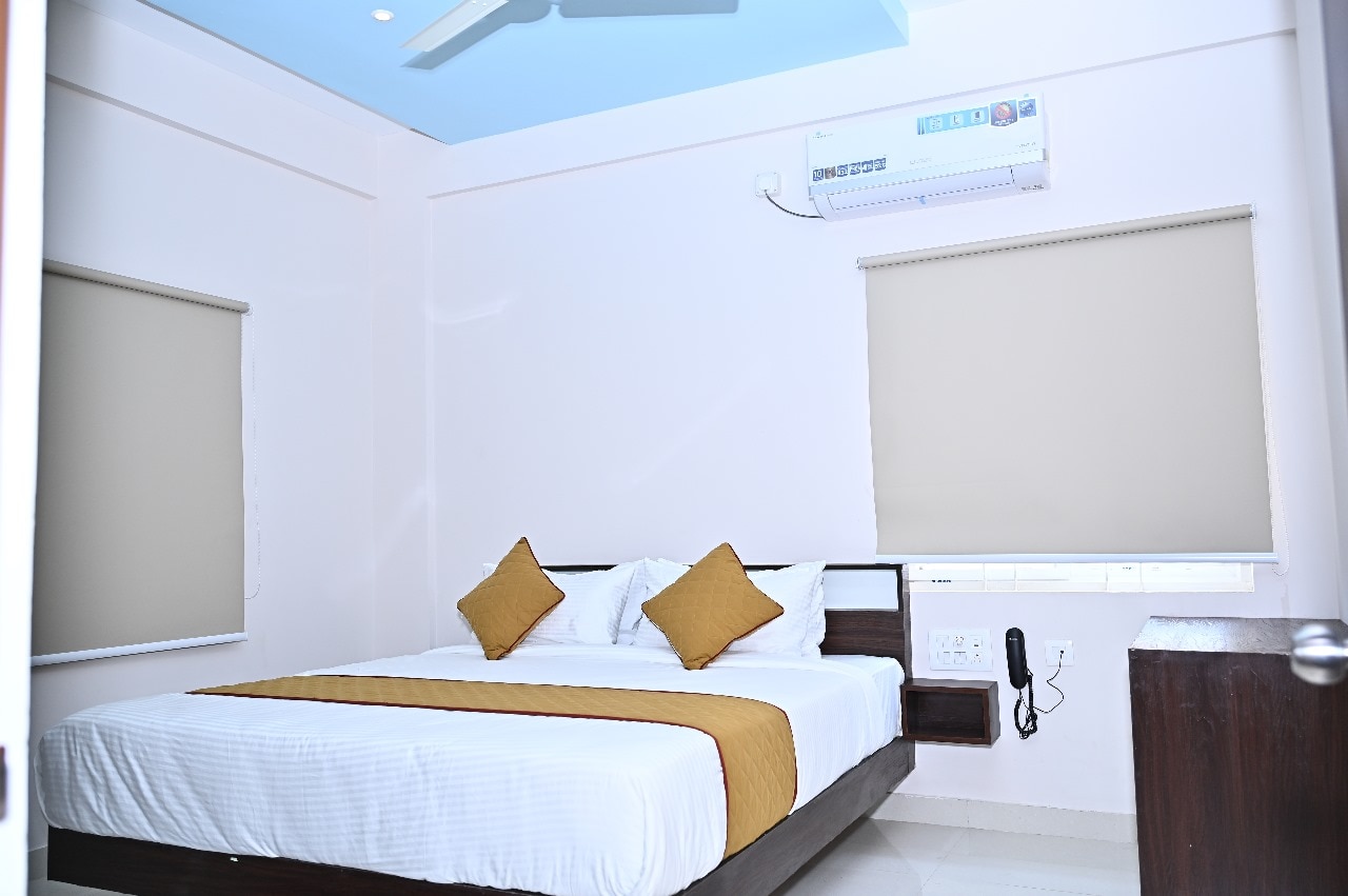 Hotel SLN Comforts - Tap to explore photos
