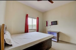 SPOT ON Vishu Moni Residency, Shrirangapattana