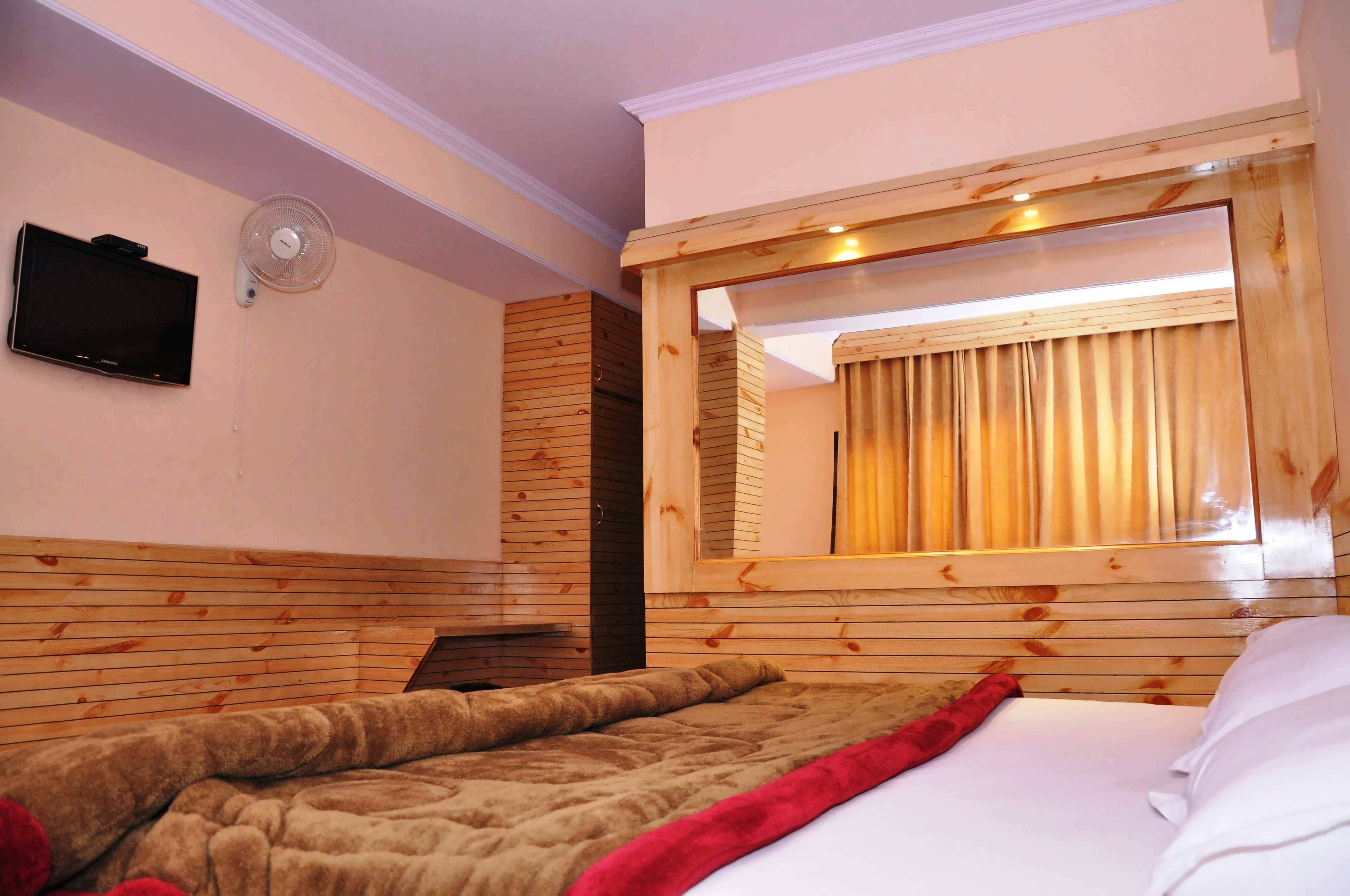 Shimla holiday inn - Tap to explore photos