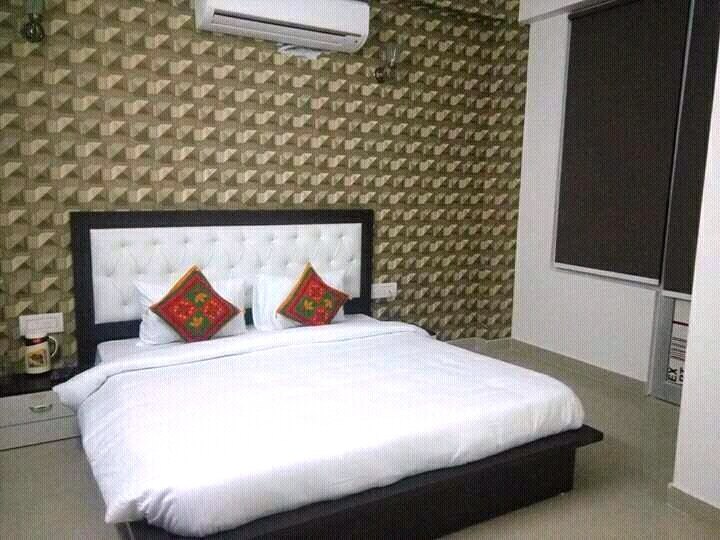 Atithi Inn Guest House - Tap to explore photos