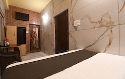 Deluxe Room by Plush Hotels