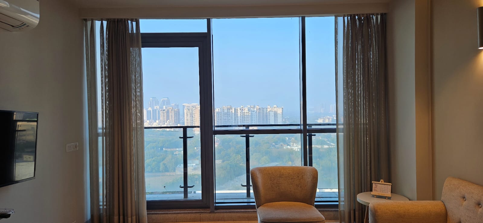The Trot Hotel & Suites Near Yashobhoomi - Tap to explore photos