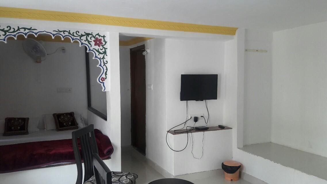 Akshara Guest House (AC Room) - Tap to explore photos