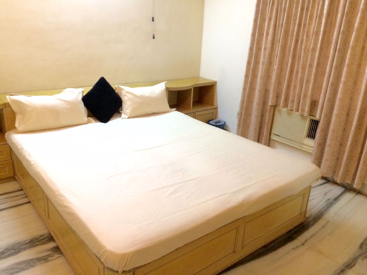 Private AC Room for couples and travelers near Empire Mall - Tap to explore photos