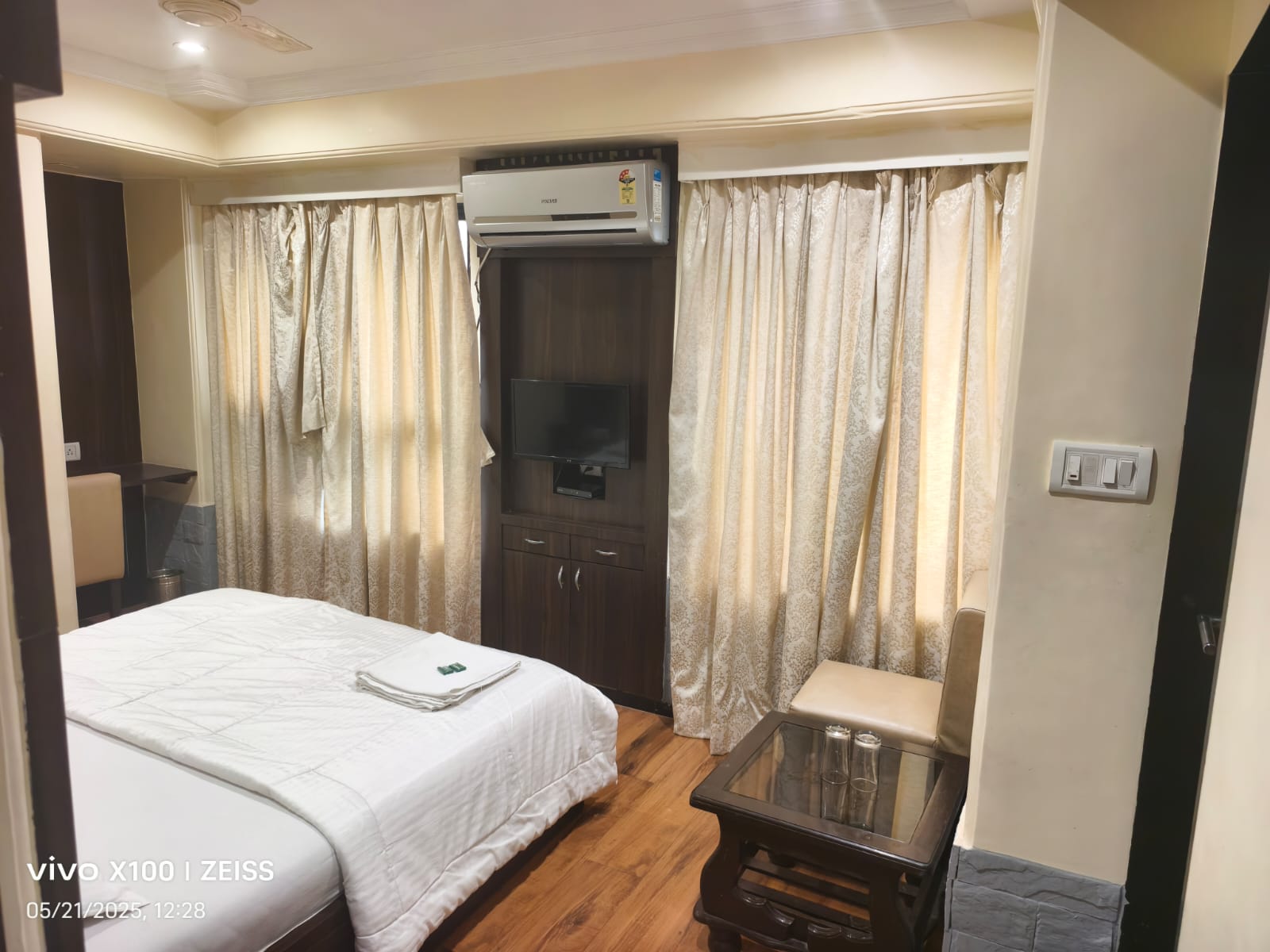 Hotel Divya International - Tap to explore photos