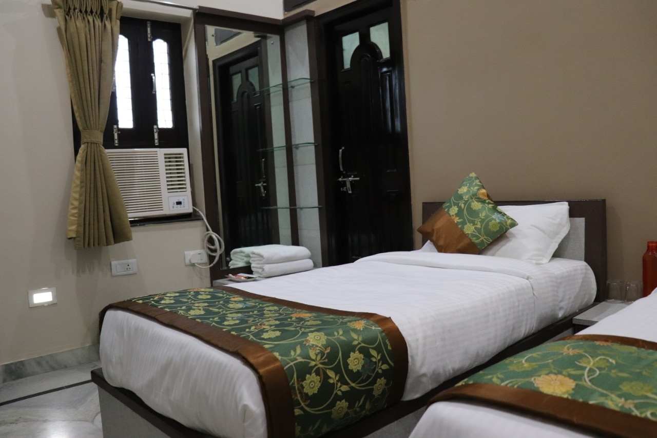 Guru Kripa Excellency Hotel - Tap to explore photos