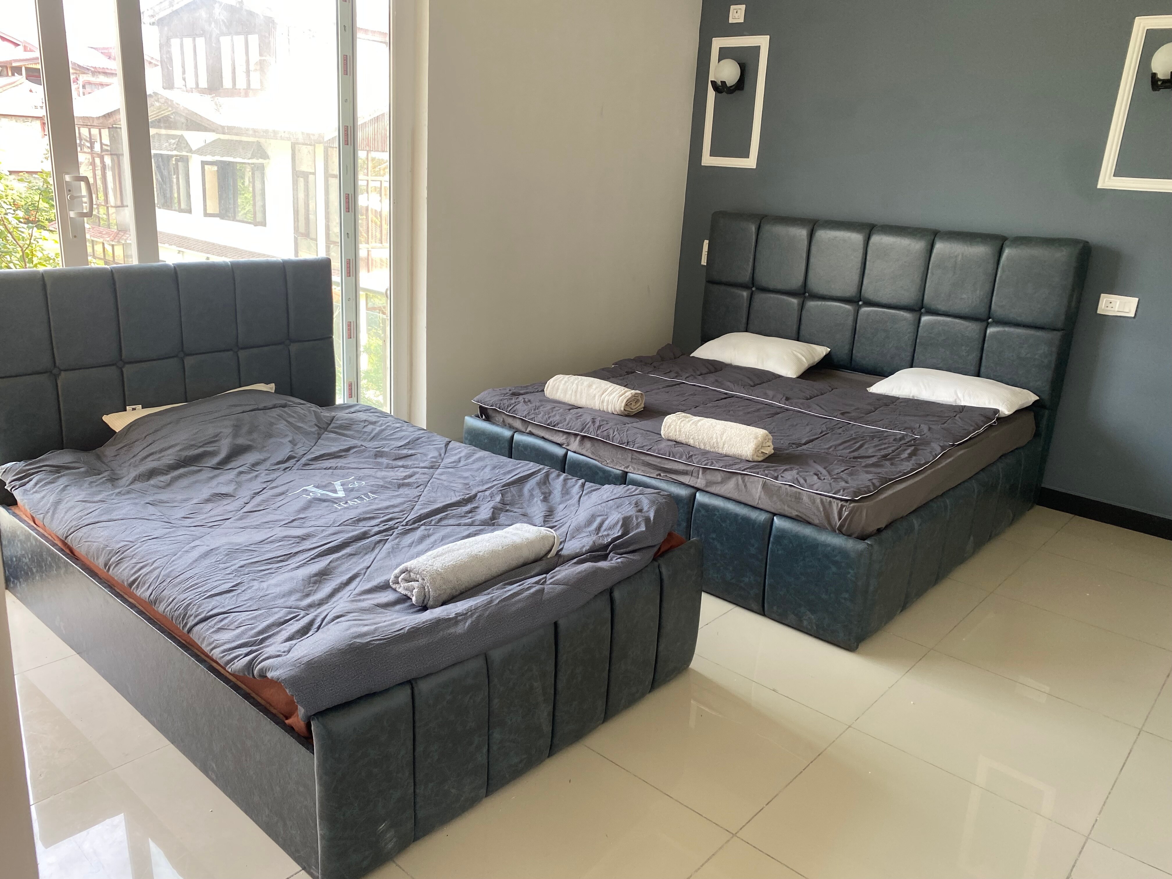 stay in srinagar Razain suites - Tap to explore photos