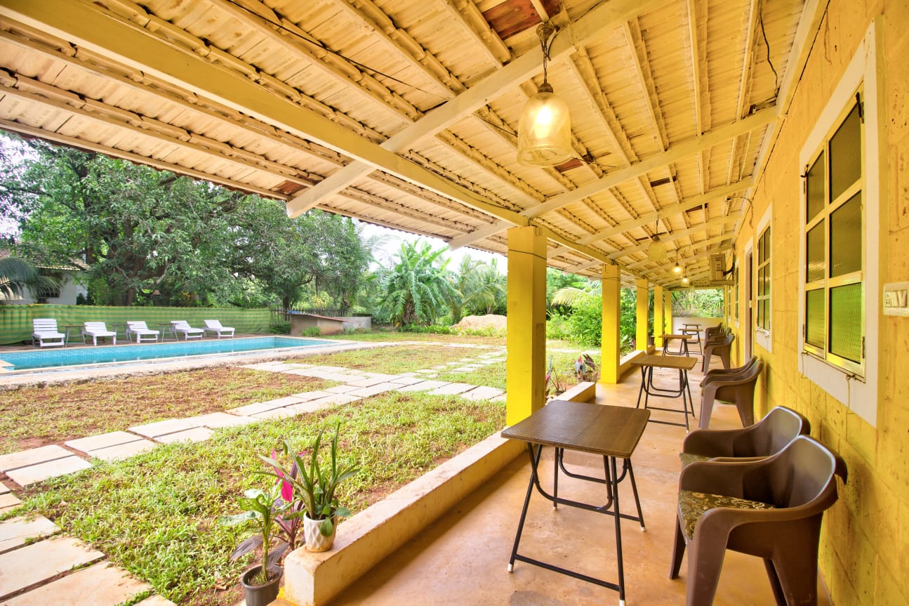 6 BHK Yellow Villa - Tap to explore photos