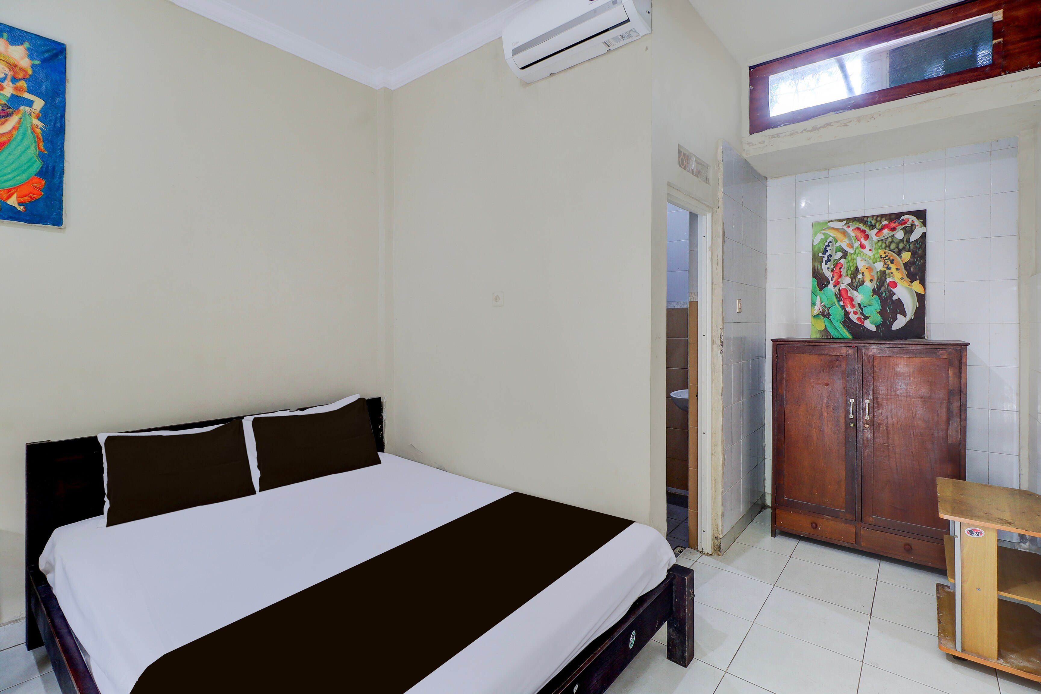 Collection O Bali near Beachwalk Shopping Center formerly Budget Door Legian Inn - Tap to explore photos