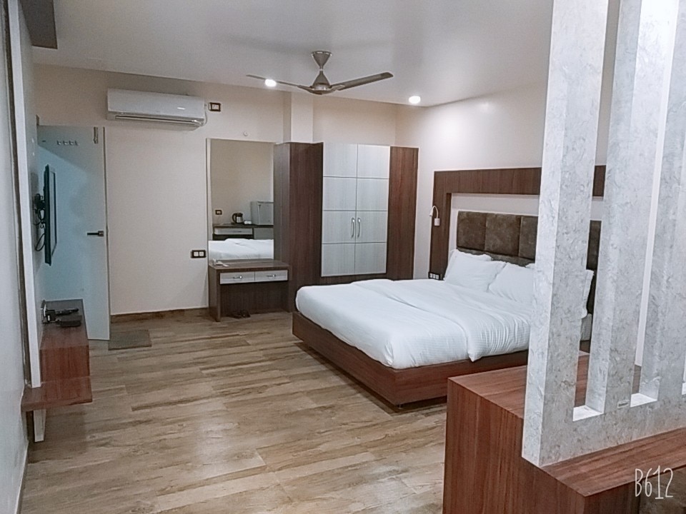 Hotel Anand Residency - Tap to explore photos
