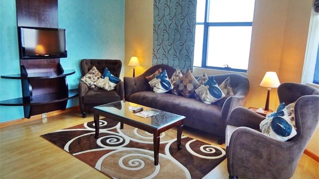 Al Jawhara Hotel Apartment - Tap to explore photos