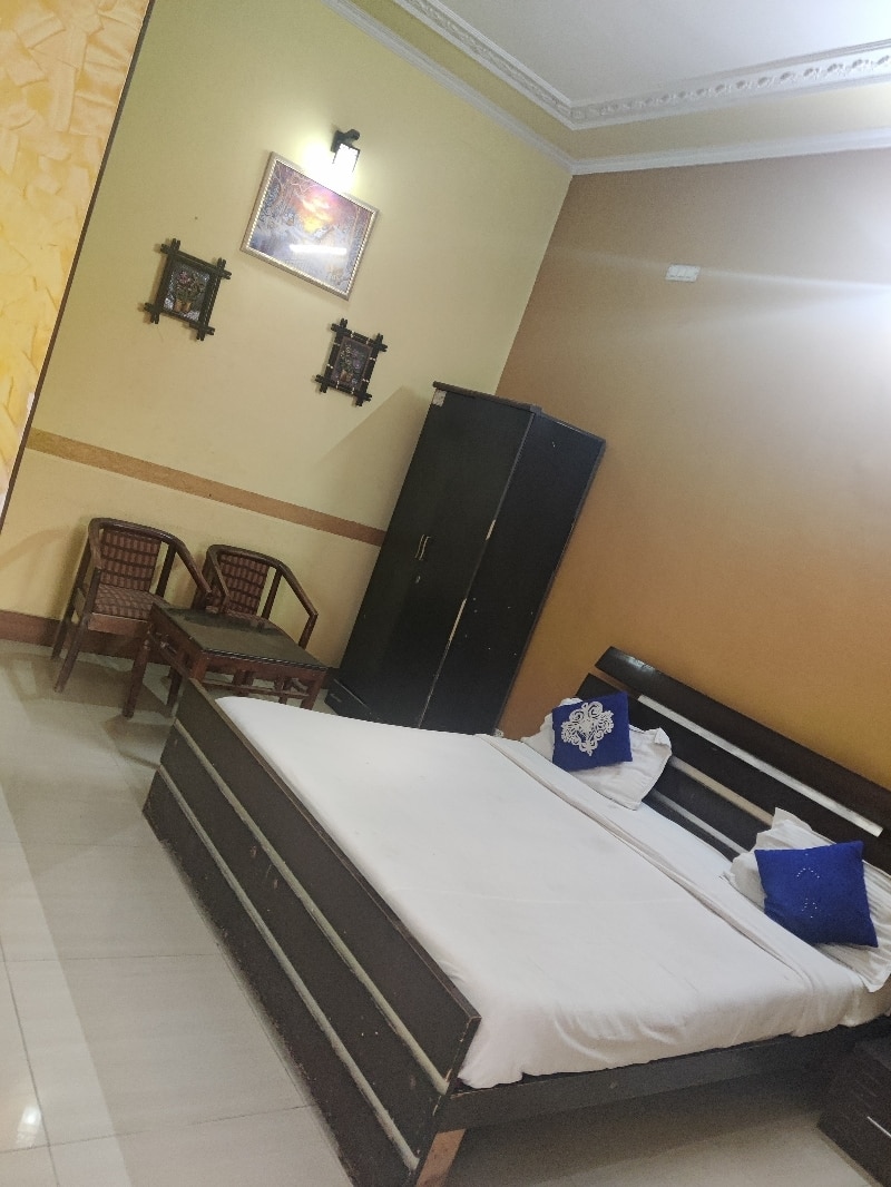 Hotel O Home Hotel Sachin - Tap to explore photos