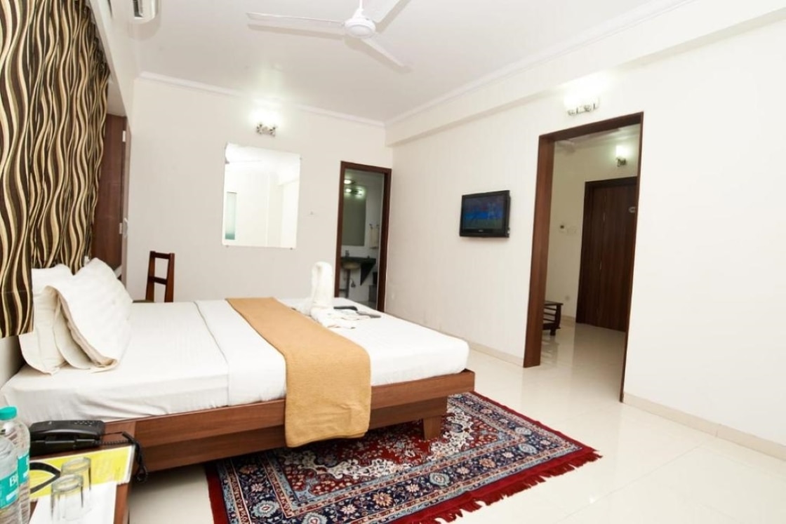 Hotel Sai Sangam - Tap to explore photos