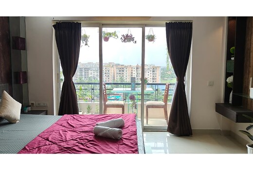 Entire 1 RK Flat with Pool, & BALCony, Gym near Airport & CC2