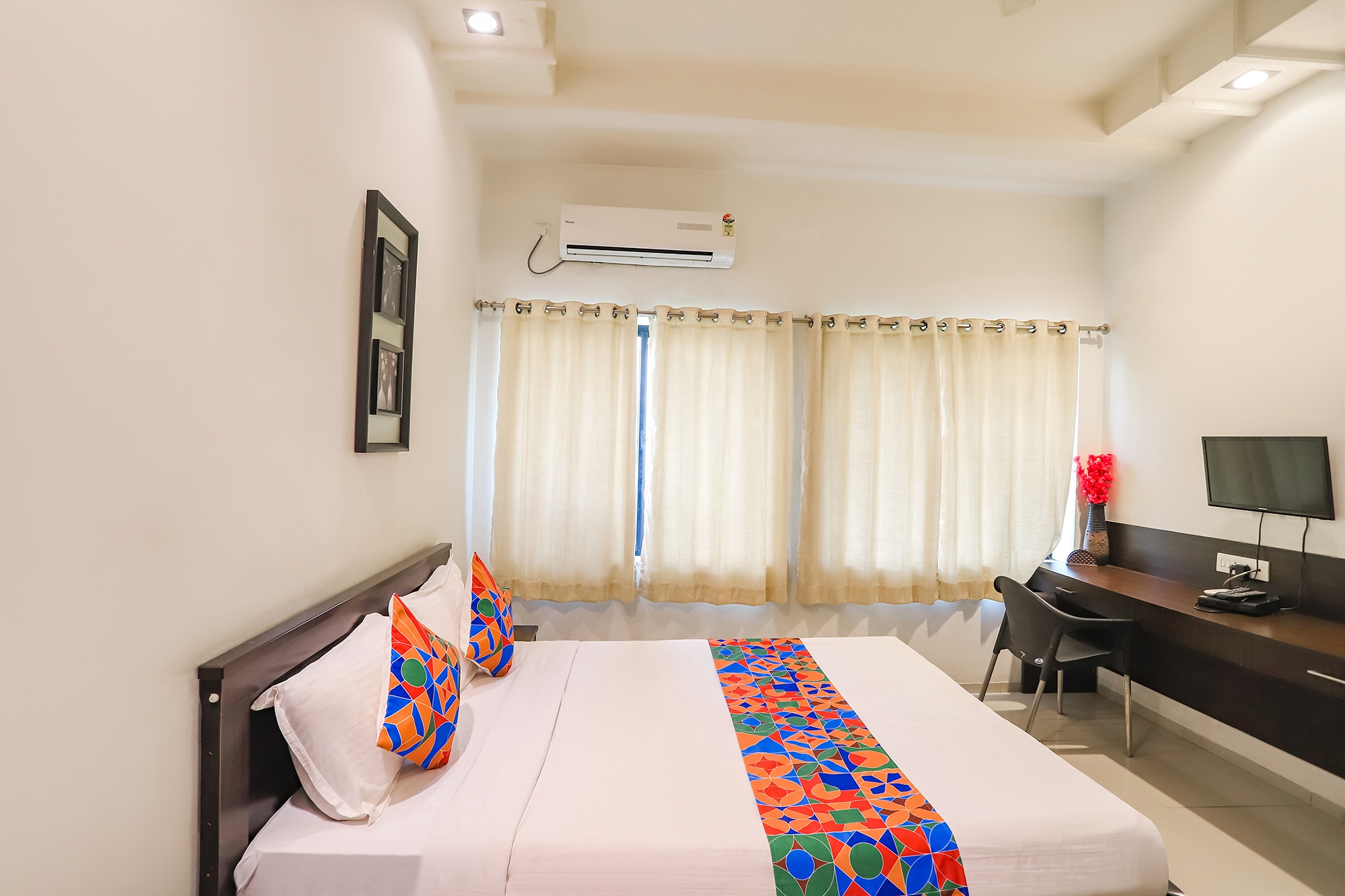 FabHotel Archanil Apartment - Sitanagar Cricket Ground - Tap to explore photos