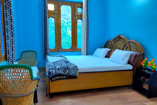 Tirthan river front farm stay.