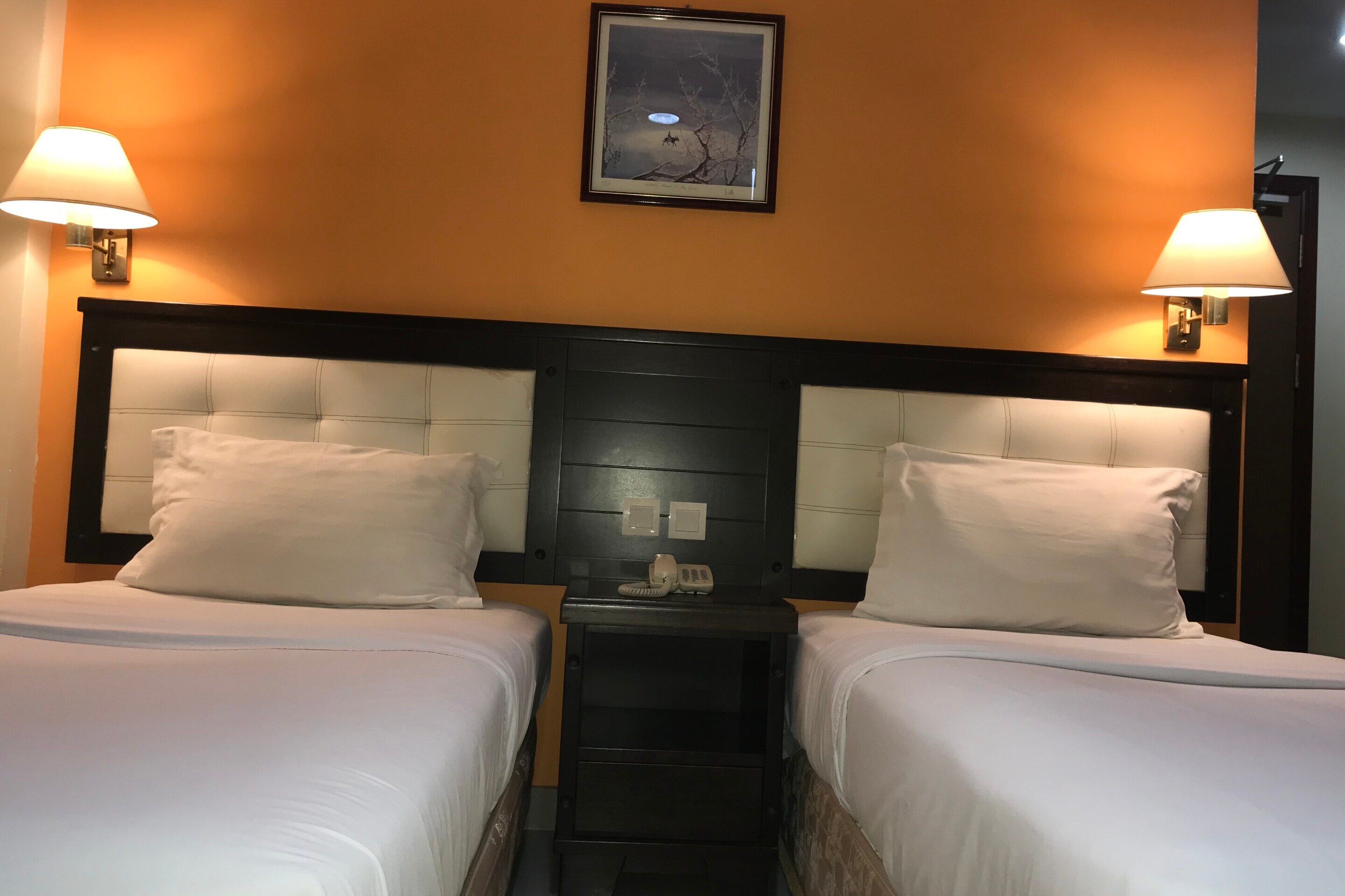 Super OYO 90055 Mansion Inn - Tap to explore photos