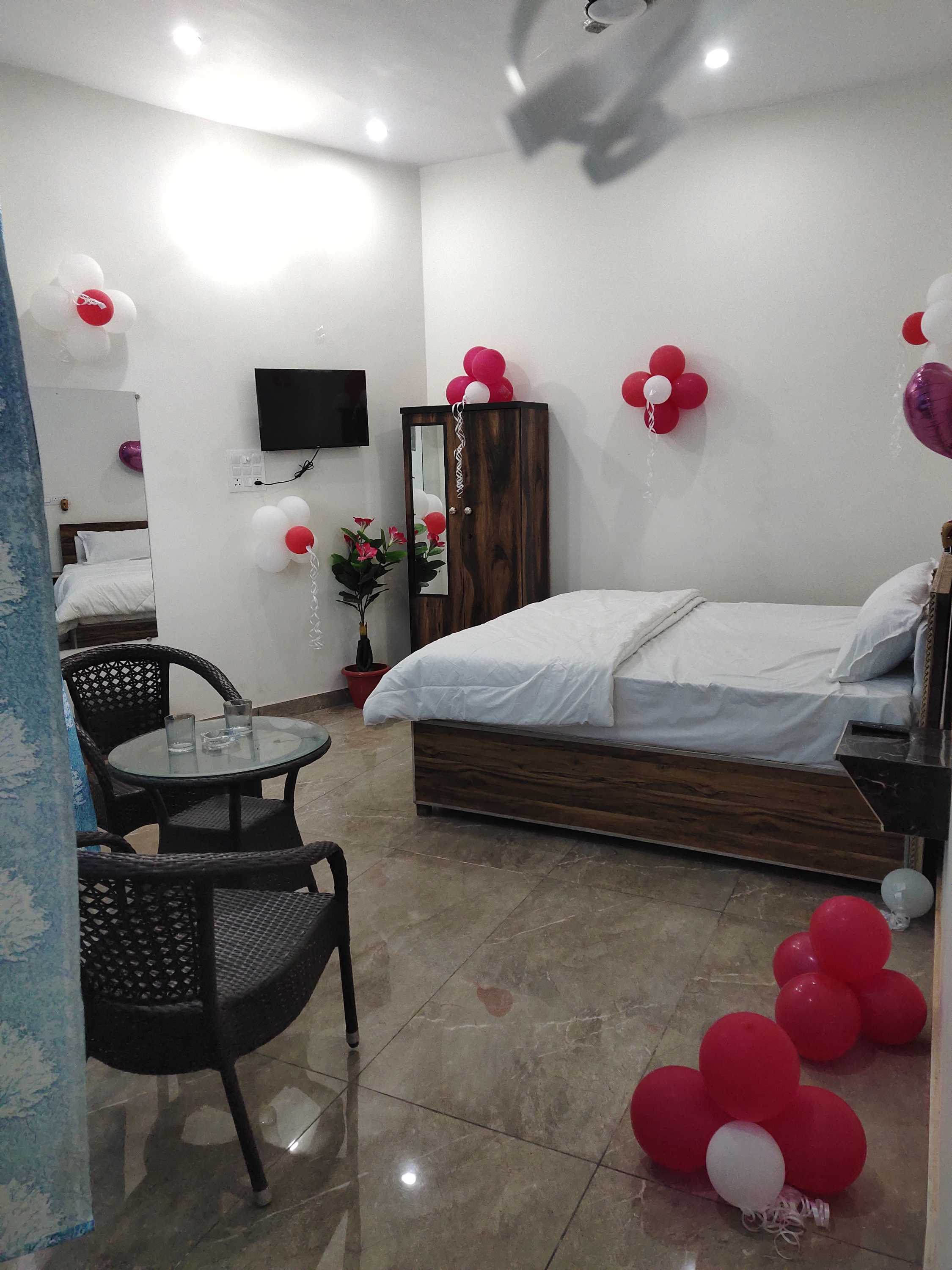 Hotel O HOME The Trust Residency - Tap to explore photos