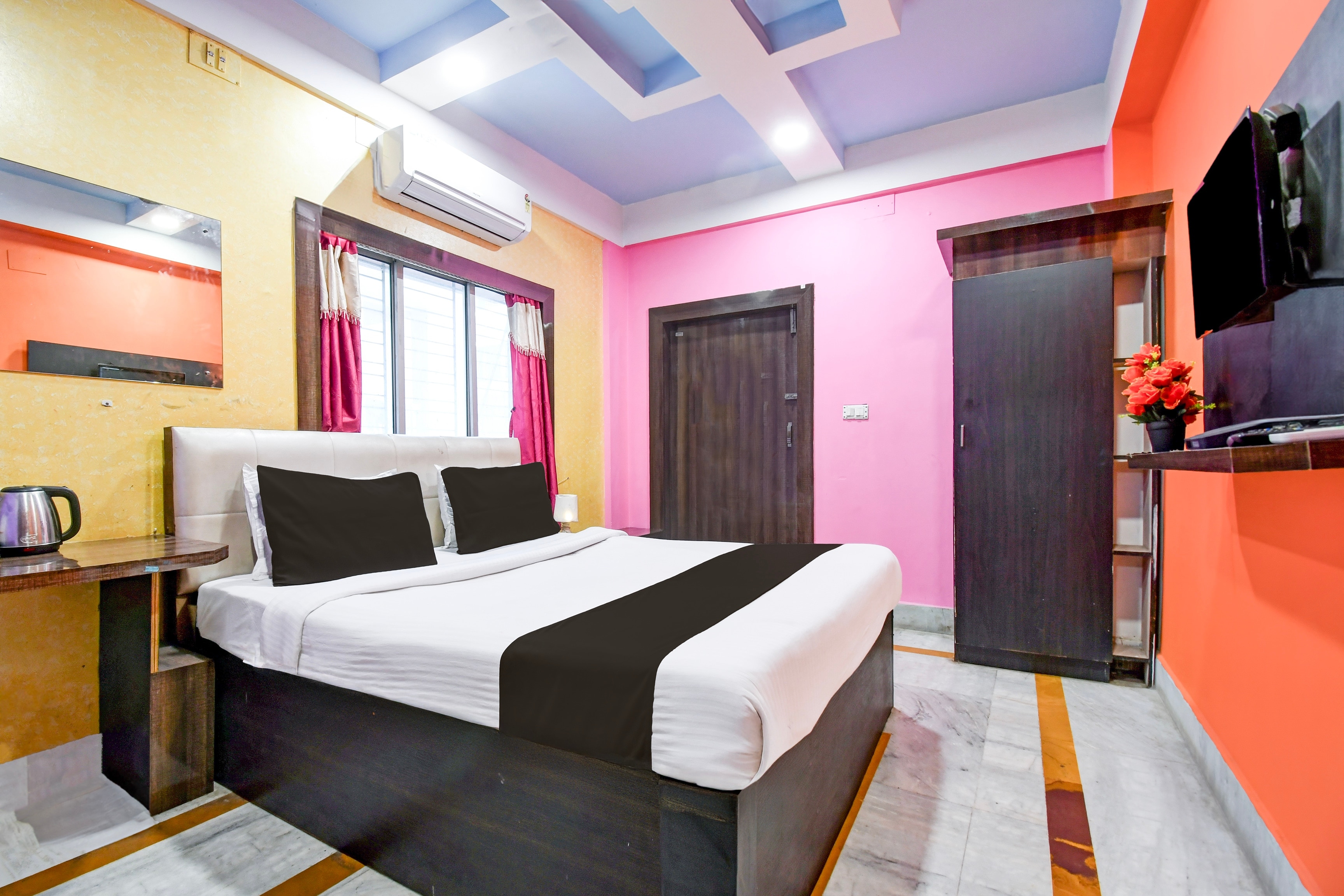 Super Collection O New Town Near Ahrini Market formerly Puja Residency - Tap to explore photos