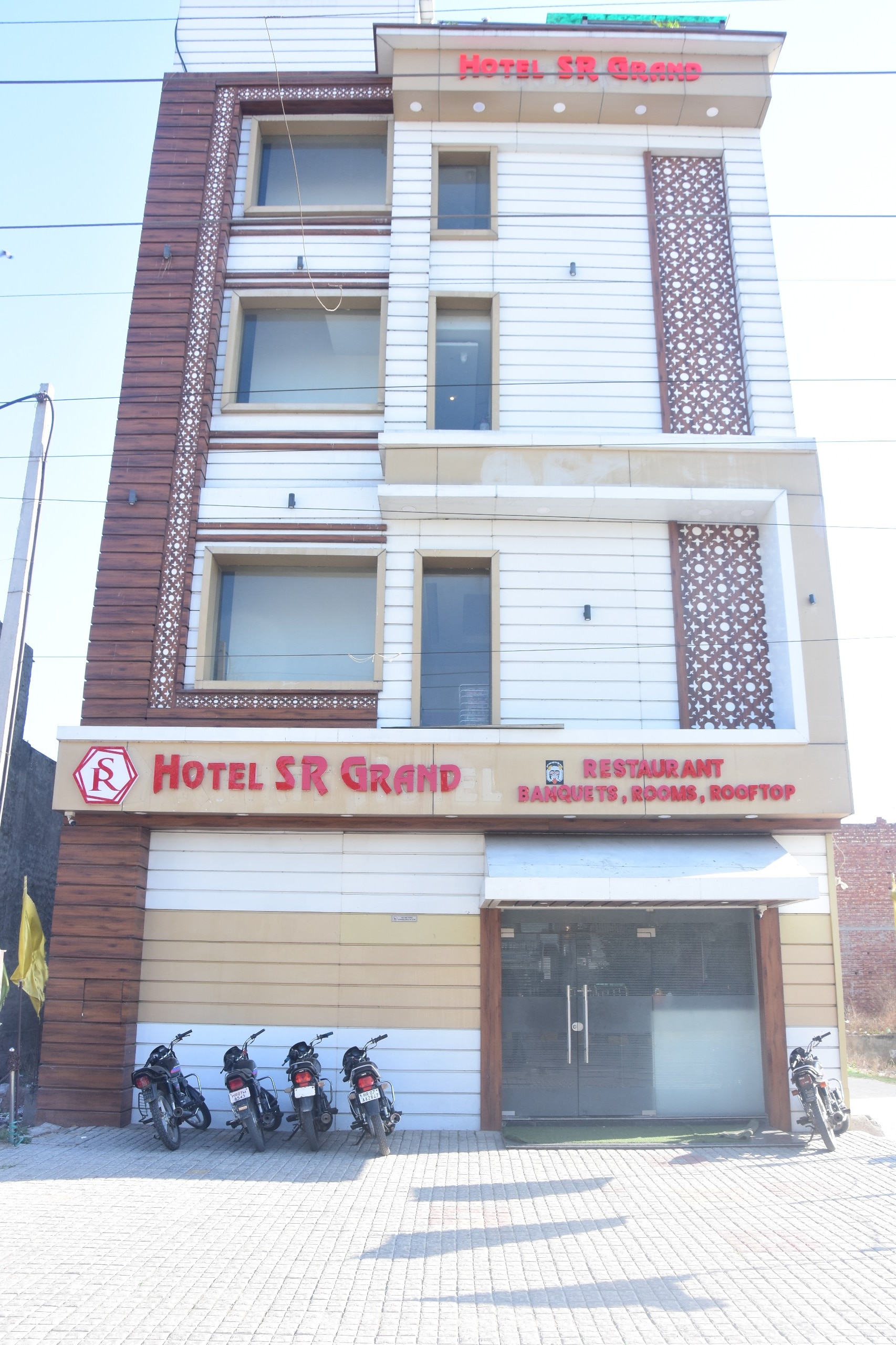 Hotel SR Grand - Tap to explore photos