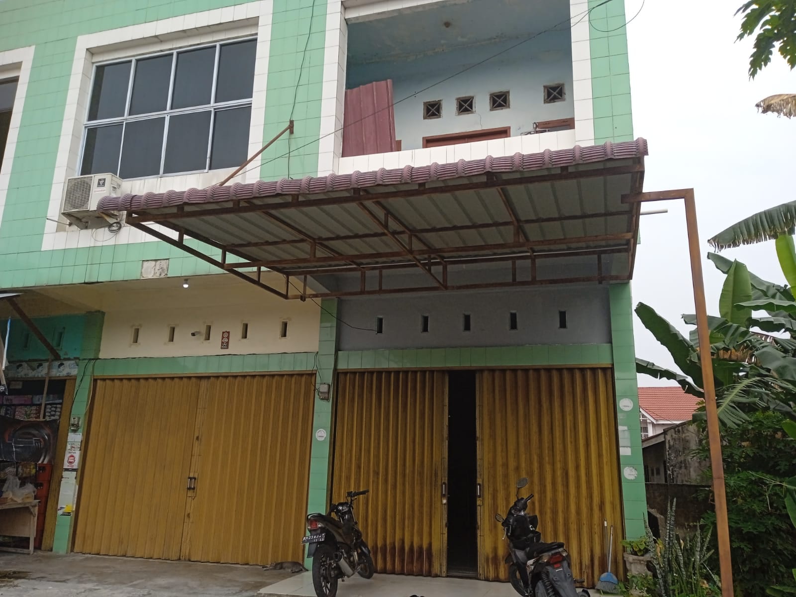 OYO 93192 Andesta Guest House Syariah - Tap to explore photos