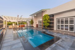 StayVista at Villa Cobblestone w/ Pool & Terrace, Nashik