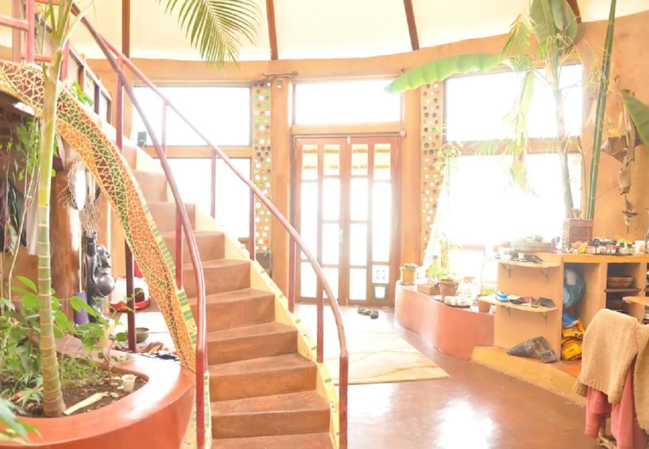 Earthship Karuna: Breathtaking Off Grid Eco Home - Tap to explore photos