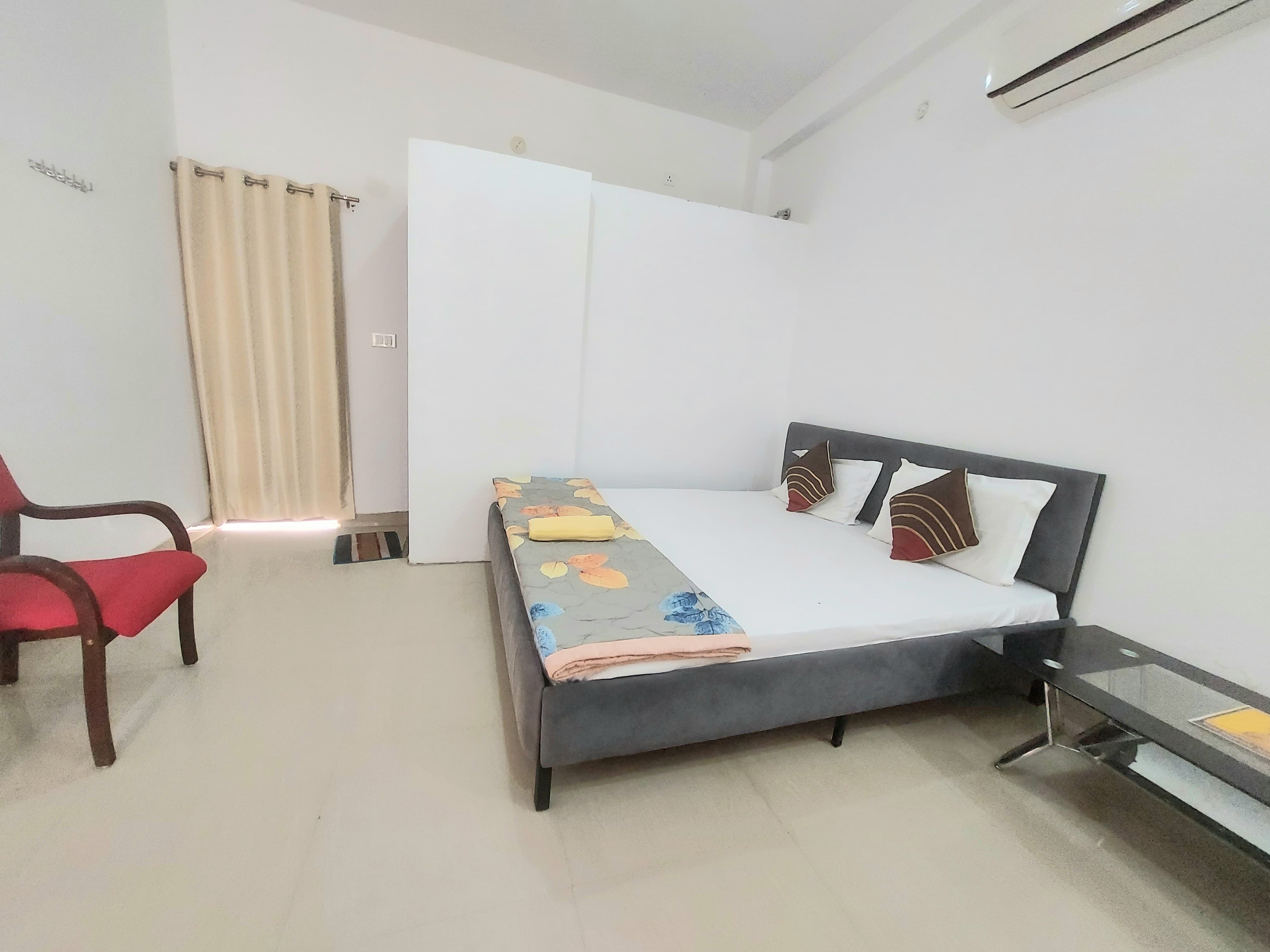 1RK Suite - 102 @ Kanti Villa MahaShiva Retreat - Tap to explore photos