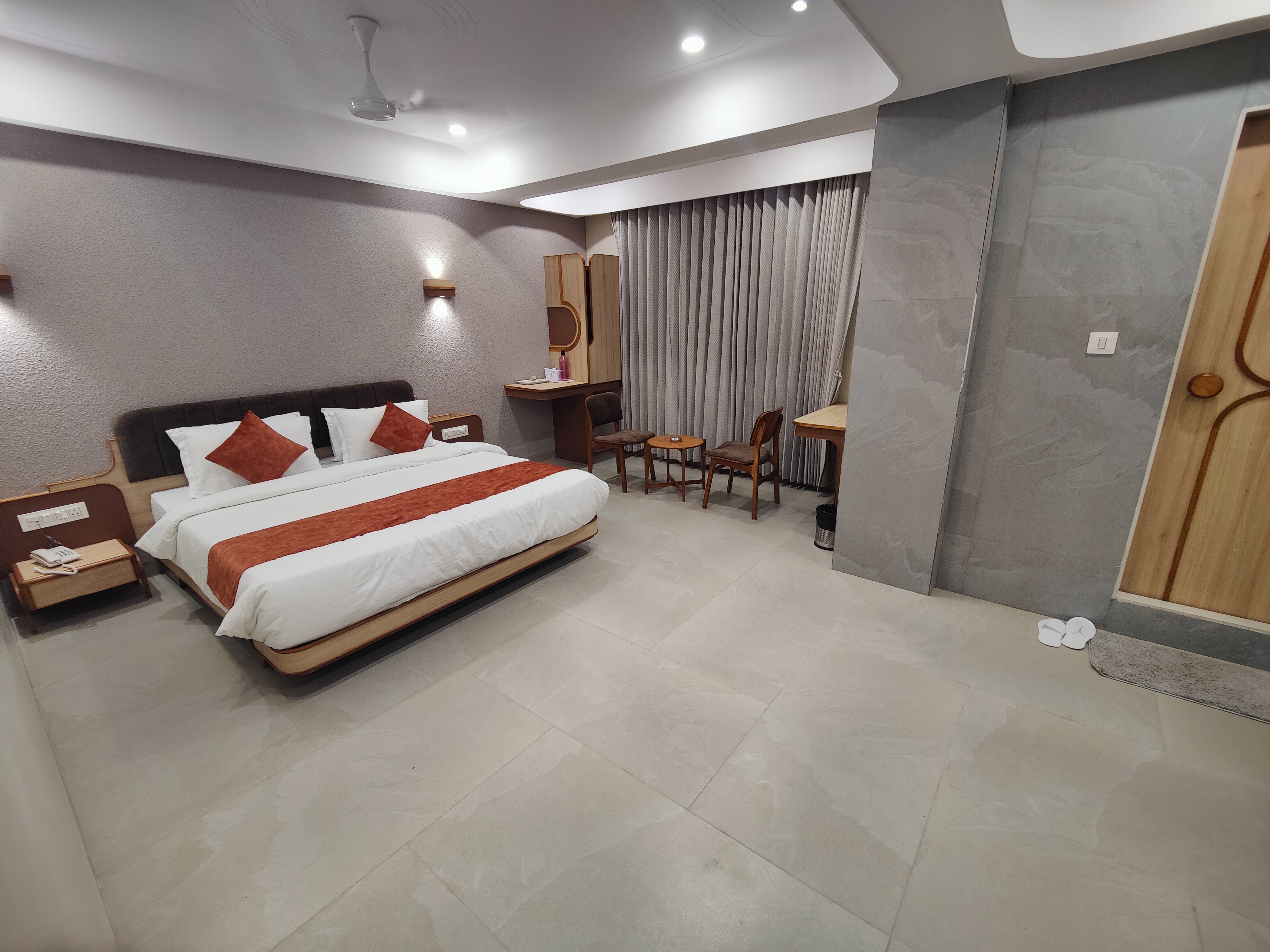 Hotel Tulsi - Tap to explore photos