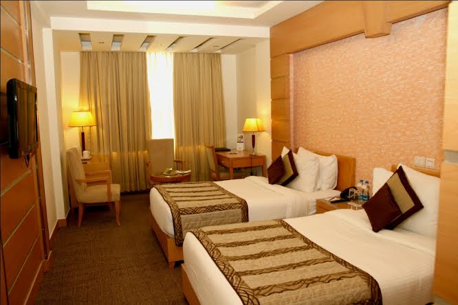 Hotel Saffron Kiran - Tap to explore photos