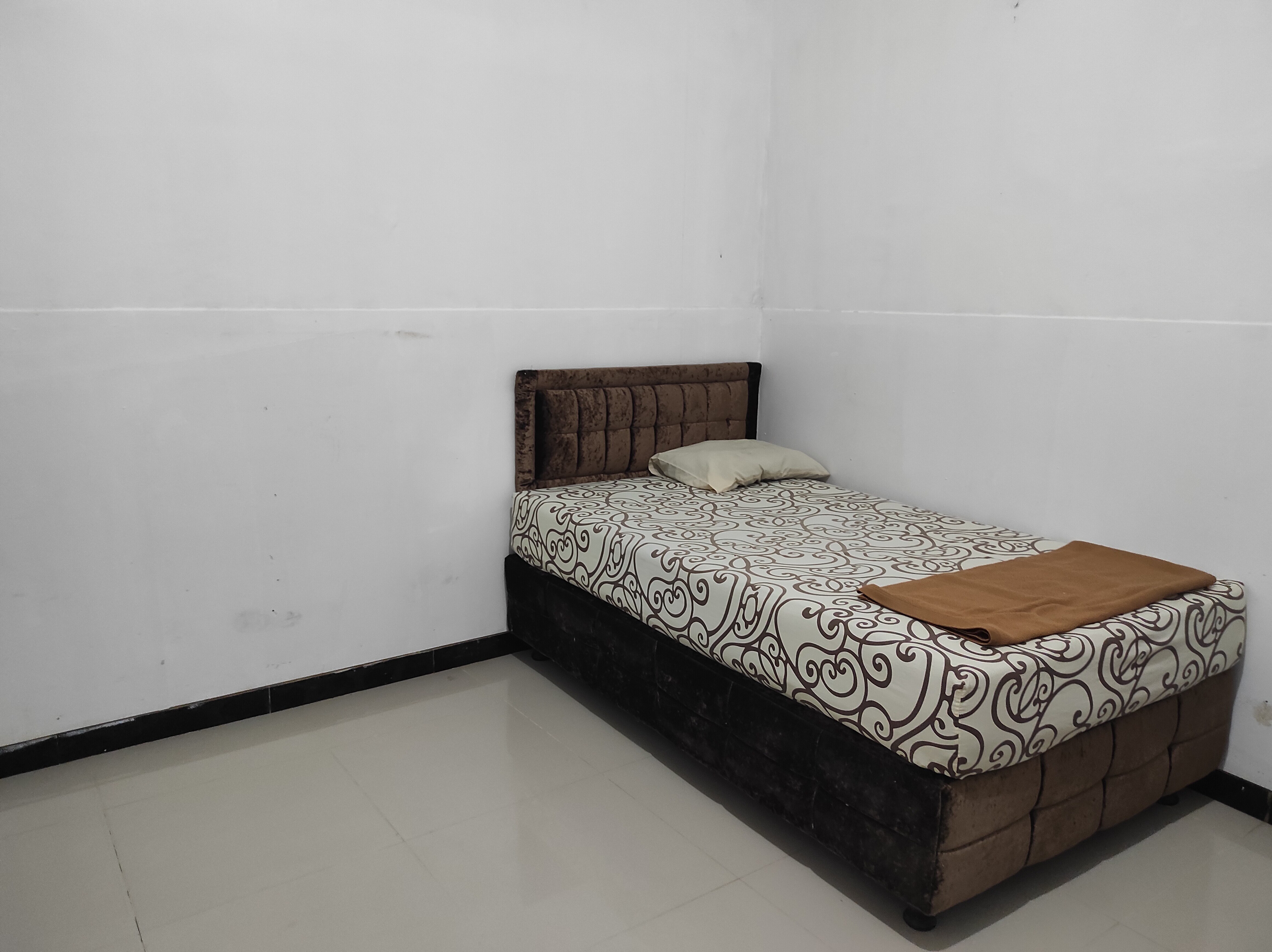OYO 93060 Wisma Astukara Syariah - Tap to explore photos