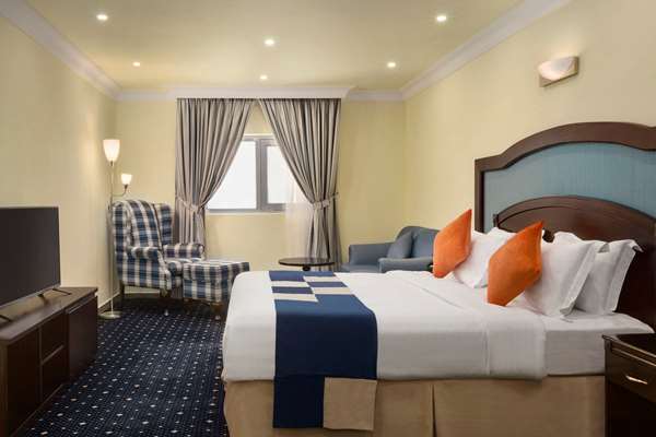 Howard Johnson by Wyndham Dammam - Tap to explore photos