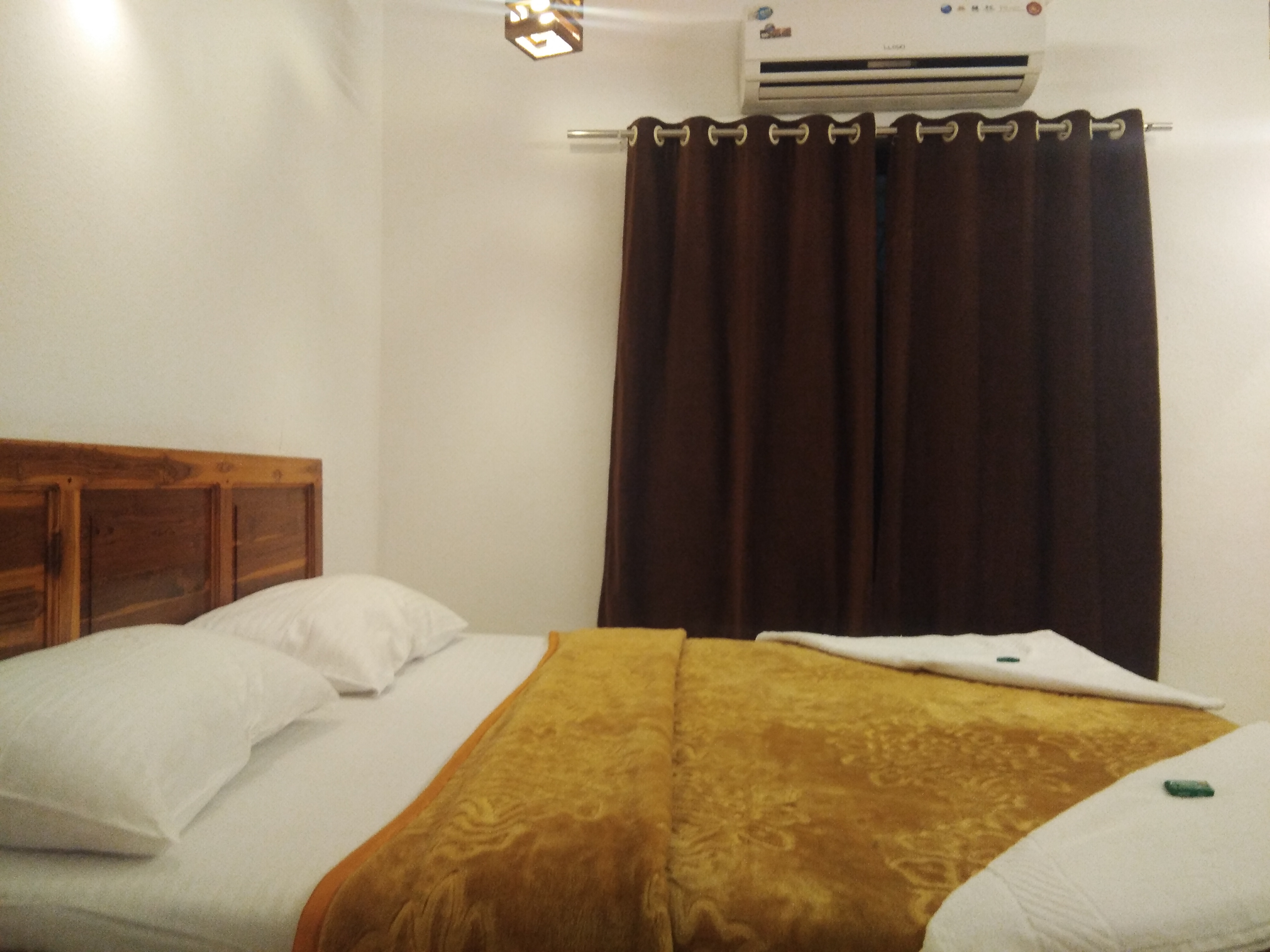 The Shanti Sadan Homestay | Rooms & Kitchen - Tap to explore photos