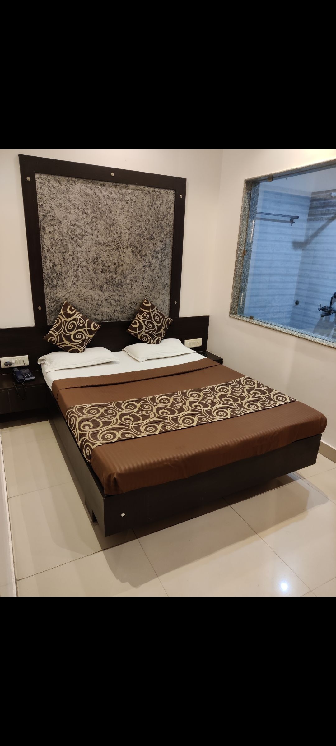 Hotel Atul Residency - Tap to explore photos