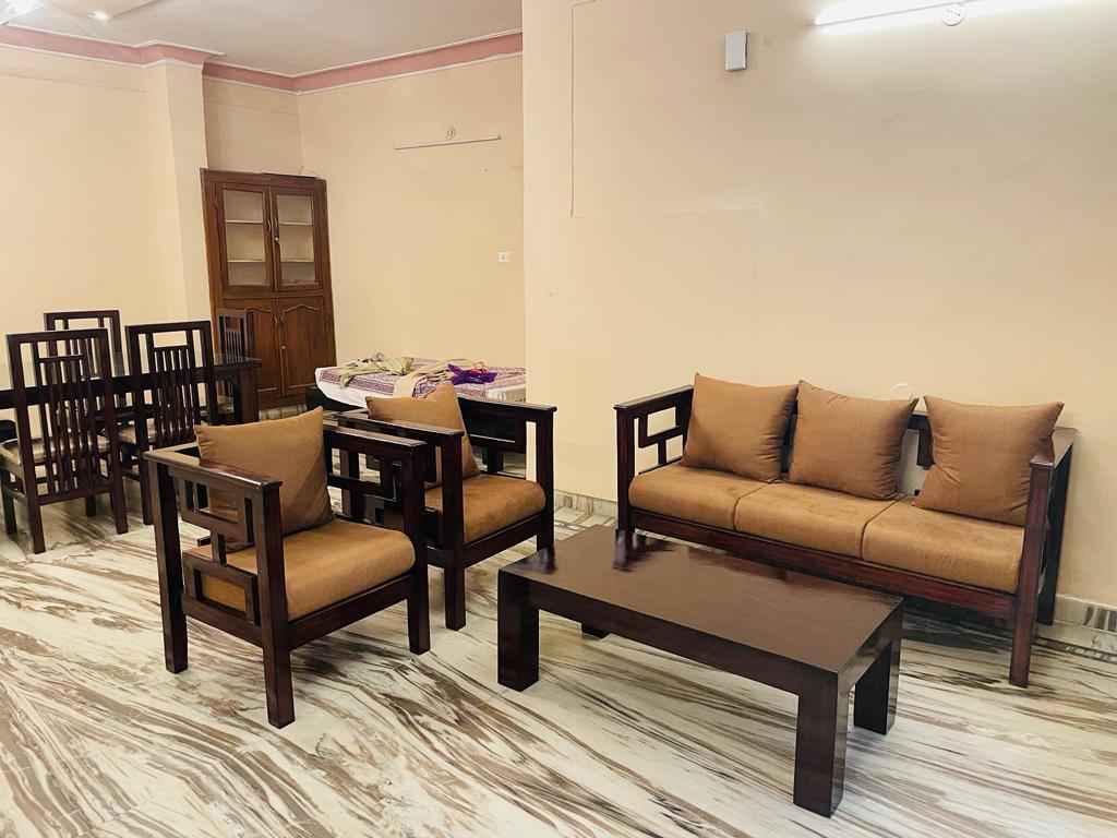 Visitors Lounge by MMG 2BHK Ground Floor Apartment - Tap to explore photos