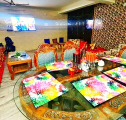 living room with dining table and smart tv