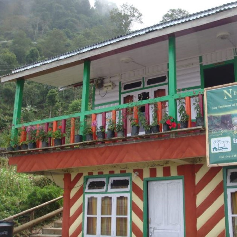 Neora Valley Eco Huts - Tap to explore photos