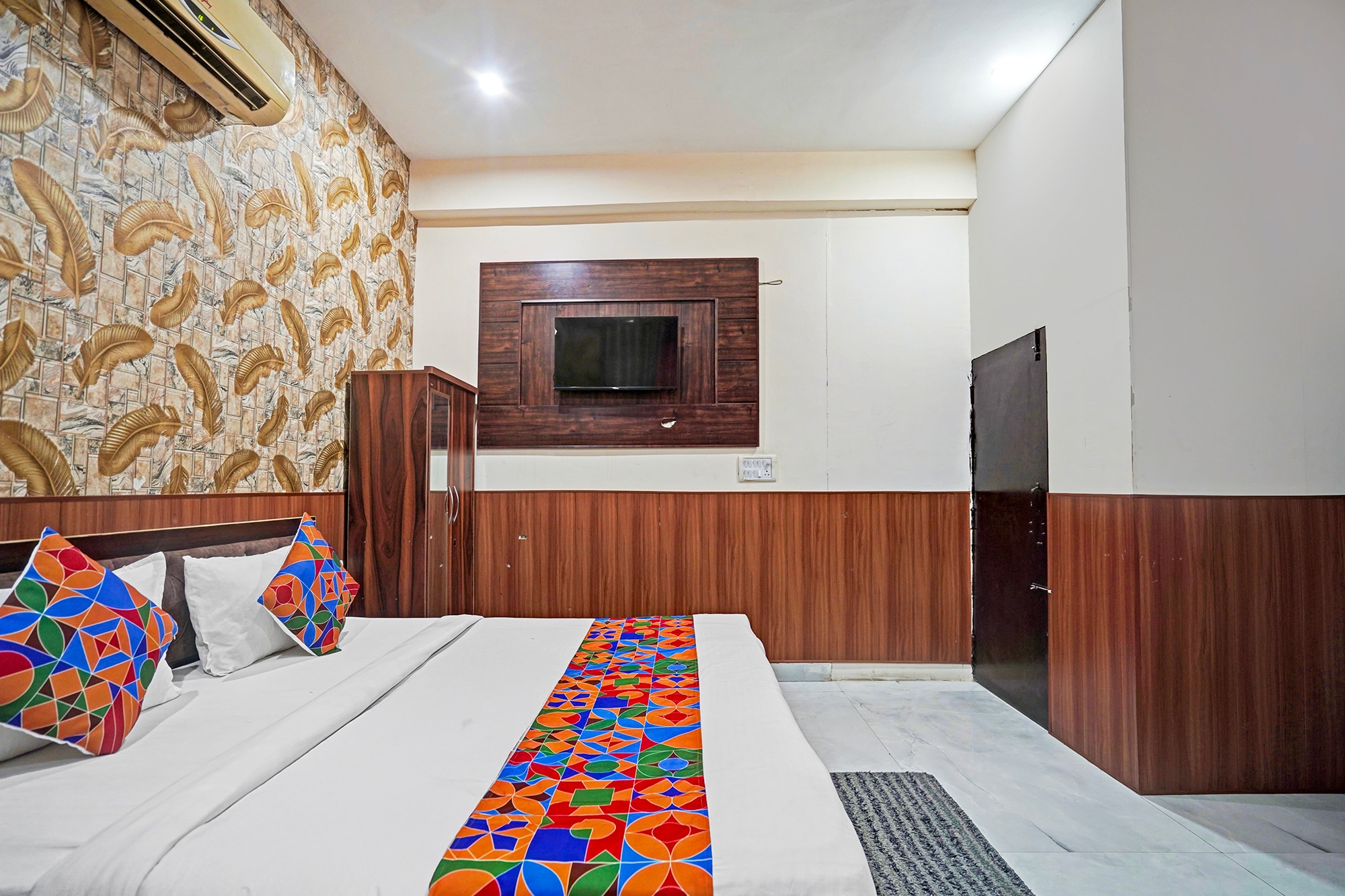 FabHotel Comfort Inn - Tap to explore photos