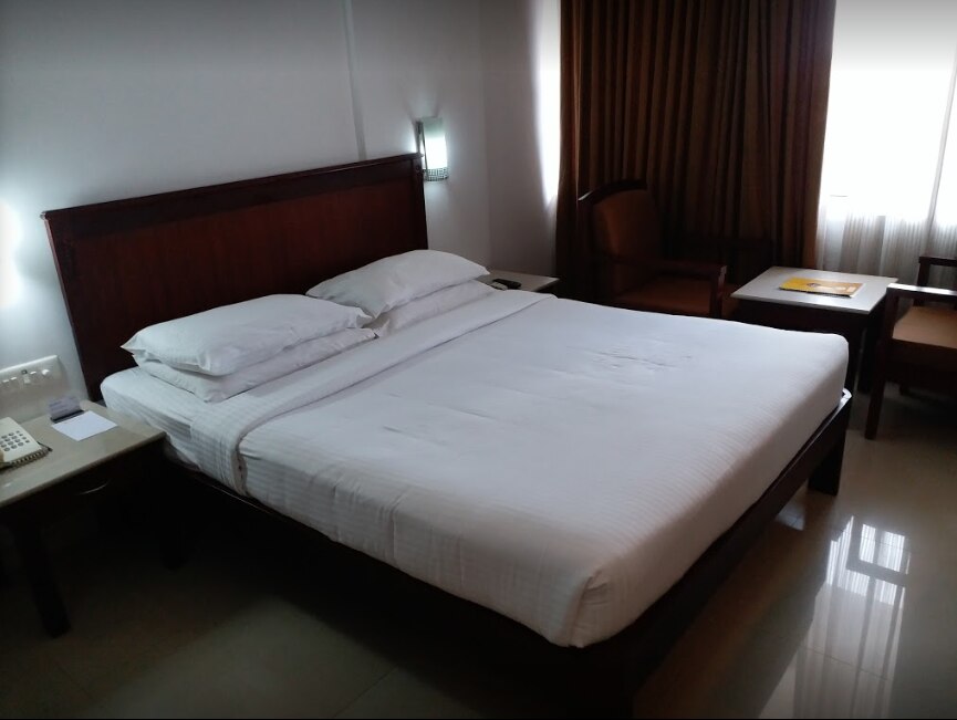 HOTEL POORAM INTERNATIONAL - Tap to explore photos