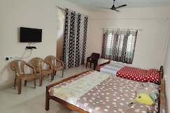 Vidhara Rooms | 5 min drive to KIMSHEALTH Hospital, Thiruvananthapuram