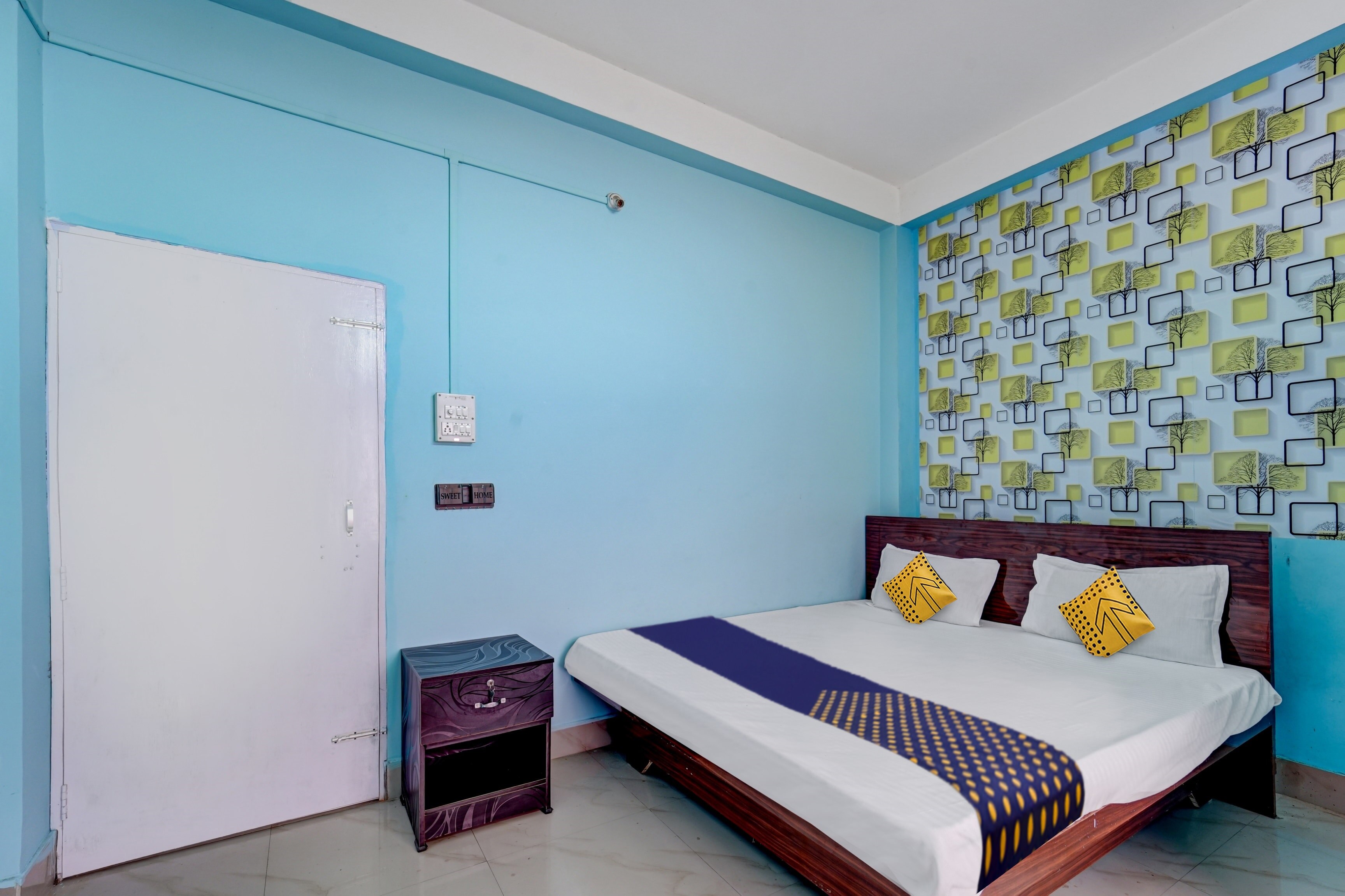 Hotel O Home Trimurti guest house - Tap to explore photos